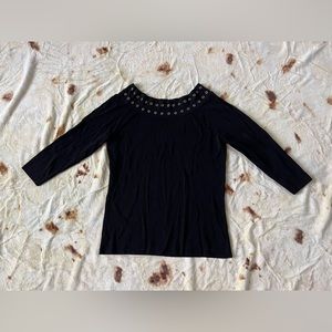 Black ribbed top with metal eyelets along scoop neck (optional off the shoulder)
